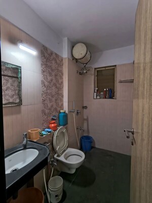 Bathroom in 2 BHK Apartment at Soham Garden, Manpada – for Rent