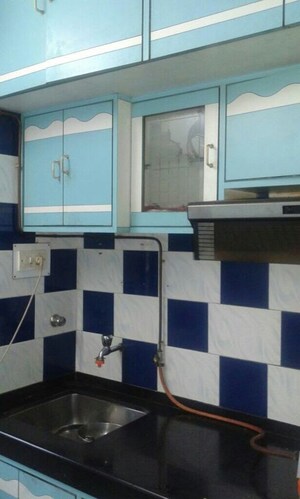 Kitchen in 1.5 BHK Apartment at Saket Complex, Kalwa – for Sale