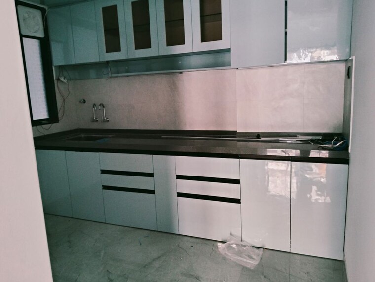 Kitchen, unique-youtopia 2 Bedroom 668 Sq.Ft. Apartment In Kharadi Pune 10167650