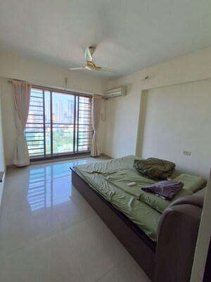 Bedroom in 2 BHK Apartment at Thakur Vishnu Shivam Tower, Kandivali East – for Rent