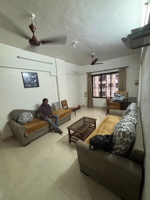 Living Room in 2 BHK Apartment at Gokul Nagari 1, Kandivali East – for Rent