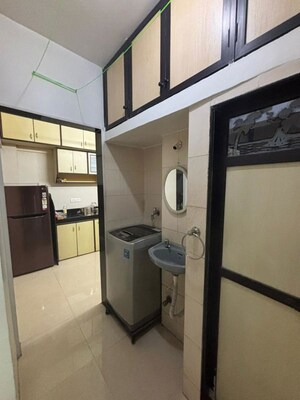 Kitchen in 2 BHK Apartment at Gokul Nagari 1, Kandivali East – for Rent