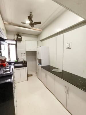 Kitchen in 2 BHK Apartment at Valley Towers Annex, Manpada – for Rent