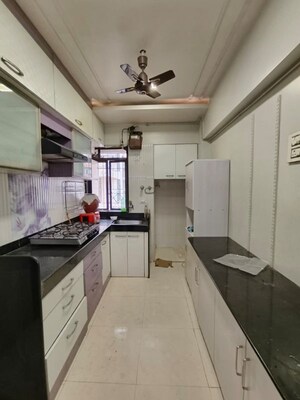 Kitchen in 2 BHK Apartment at Valley Towers Annex, Manpada – for Rent