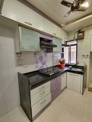 Kitchen in 2 BHK Apartment at Valley Towers Annex, Manpada – for Rent