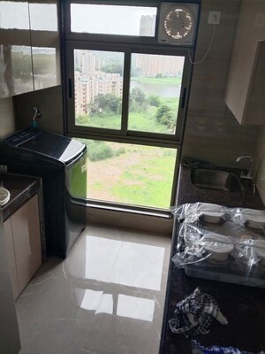Kitchen in 1 BHK Apartment at Ajmera Boulevard, Malad West – for Rent