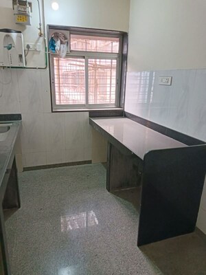 Kitchen in 1 BHK Apartment at Kalpataru Hills, Manpada – for Sale