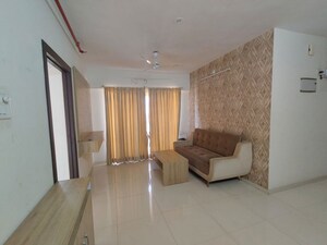 Living Room in 2 BHK Apartment at Metropolis Rivera, Kasarvadavali – for Rent