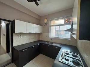 Kitchen in 3 BHK Builder Floor at Ansal API Esencia, Sector 67 – for Sale