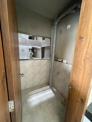 Bathroom in 2 BHK Apartment at Galaxy One, Kharadi – for Rent