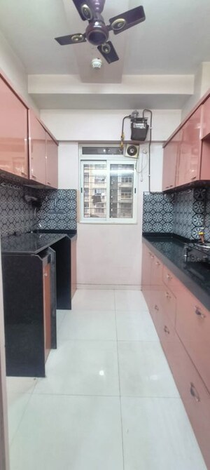Kitchen in 1 BHK Apartment at Lodha Amara, Kolshet Road – for Sale