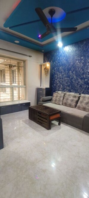 Living Room in 1 BHK Apartment at Lodha Amara, Kolshet Road – for Sale