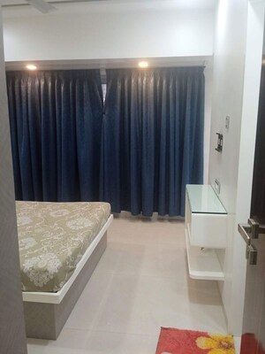 Master Bedroom in 2 BHK Apartment at Satellite Royale, Goregaon East – for Rent
