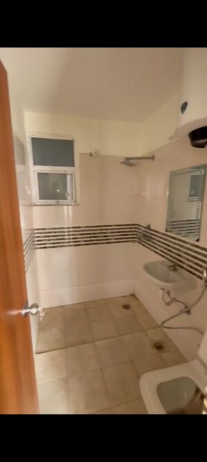 Bathroom in 2 BHK Apartment at Shree Vardhman Green Court, Sector 90 – for Rent