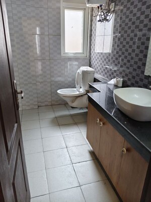 Bathroom in 4 BHK Apartment at Lotus Panache, Sector 110 – for Rent
