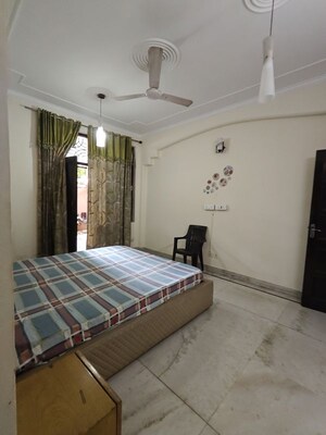 Bedroom in 3 BHK Builder Floor at Ansal Sushant Lok I, Sector 43 – for Rent