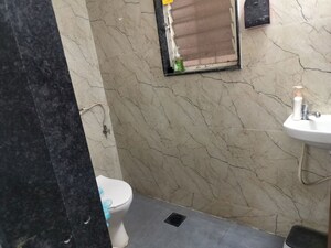 Bathroom in 1 BHK Apartment at Wadgaon Sheri – for Rent