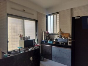 Kitchen in 1 BHK Apartment at Wadgaon Sheri – for Rent