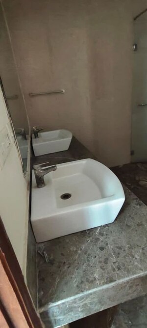 Bathroom in 3 BHK Apartment at Mahagun Mezzaria, Sector 78 – for Sale