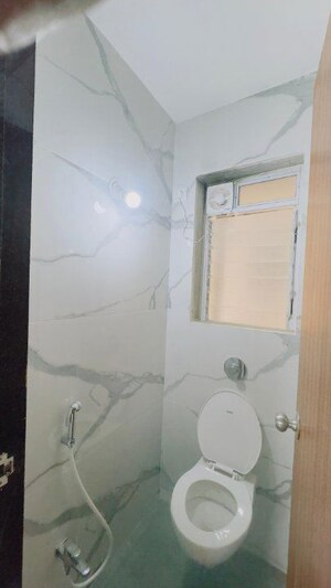 Bathroom in 1 BHK Apartment at Raunak Bliss, Ghodbunder Road – for Rent
