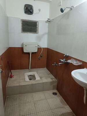 Bathroom in 3 BHK Apartment at Indu Arcade Puppalaguda, Puppalaguda – for Rent