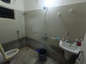 Bathroom in 3 BHK Apartment at Indu Arcade Puppalaguda, Puppalaguda – for Rent