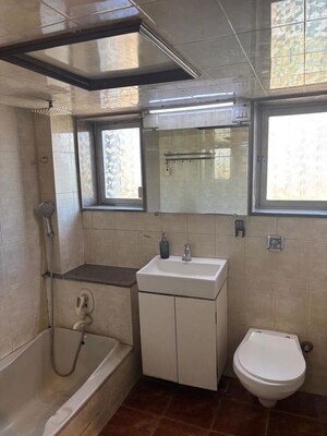 Bathroom in 1 BHK Apartment at Juhu Abhishek Chs Ltd, Andheri West – for Rent