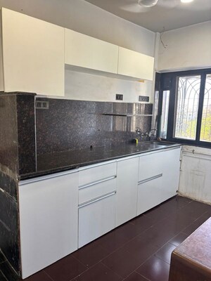 Kitchen in 1 BHK Apartment at Juhu Abhishek Chs Ltd, Andheri West – for Rent