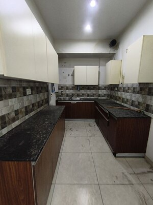 Kitchen in 4 BHK Apartment at Sushma Infinium, Ghazipur – for Rent