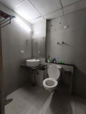 Bathroom in 4 BHK Apartment at Sushma Infinium, Ghazipur – for Rent