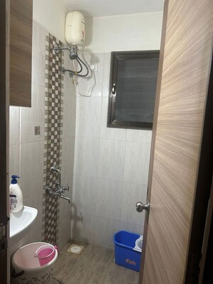 Bathroom in 1 BHK Apartment at Daulat CHS, Borivali East – for Rent
