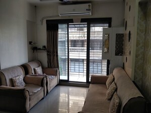 Living Room in 1 BHK Apartment at Daulat CHS, Borivali East – for Rent