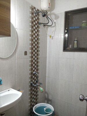 Bathroom in 1 BHK Apartment at Daulat CHS, Borivali East – for Rent