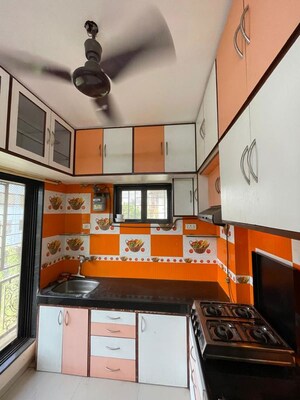 Kitchen in 2 BHK Apartment at Jalmeena CHS, Vile Parle East – for Rent