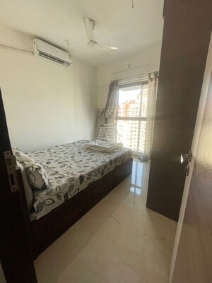 Bedroom in 2 BHK Apartment at Chandak Cornerstone, Worli – for Rent