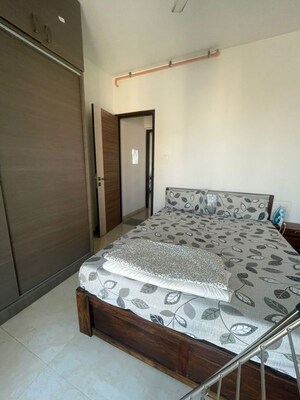 Bedroom in 2 BHK Apartment at Chandak Cornerstone, Worli – for Rent