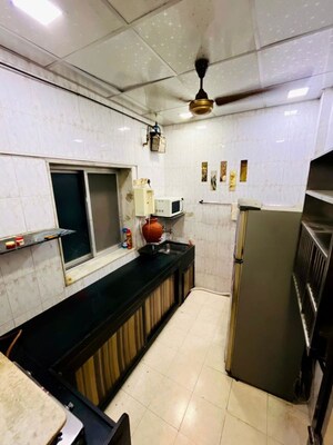 Kitchen in 2 BHK Apartment at Satyam CHS Goregaon West, Goregaon West – for Rent