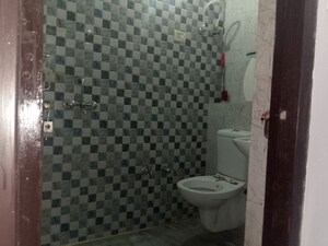 Bathroom in 3 BHK Builder Floor at Dwarka Mor – for Rent