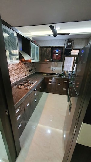 Kitchen in 2 BHK Apartment at Laxmi Narayan Residency, Vartak Nagar – for Rent