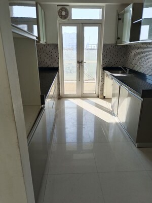 Kitchen in 2 BHK Apartment at Omkar Alta Monte, Malad East – for Sale