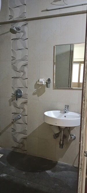 Bathroom in 3 BHK Apartment at HDIL Metropolis Residences, Andheri West – for Rent