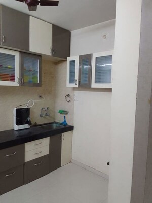 Kitchen in 2 BHK Apartment at Gobind Ganesh Imperia, Wakad – for Sale