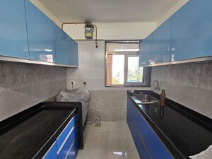 Kitchen in 1.5 BHK Apartment at Veena Nagar CHS Malad, Malad West – for Rent