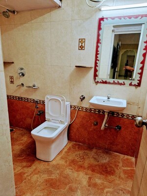 Bathroom in 3 BHK Apartment at Garden View Apartment, Goregaon East – for Rent