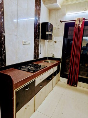 Kitchen in 3 BHK Apartment at Garden View Apartment, Goregaon East – for Rent