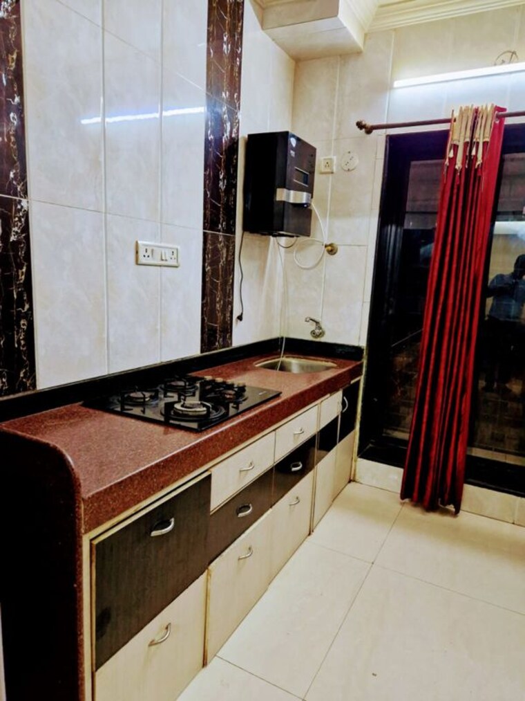 Kitchen, garden-view-apartment 3 Bedroom 1278 Sq.Ft. Apartment In Goregaon East Mumbai 10169004
