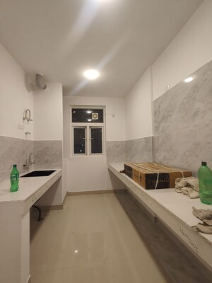 Kitchen in 2 BHK Apartment at Omaxe Hazratganj Residency, Gomti Nagar – for Sale