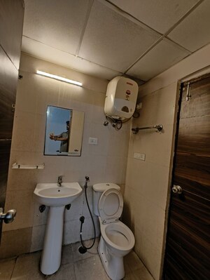 Team Area in 2 BHK Apartment at Aims Golf City, Sector 75 – for Rent