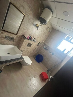 Bathroom in 4 BHK Apartment at Artique Uptown Skylla, International Airport Road – for Rent