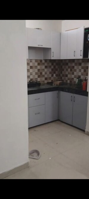 Kitchen in 1 BHK Apartment at Shree Vardhman Green Court, Sector 90 – for Rent